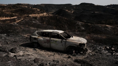 Manche Menschen wollten vor den Flammen fliehen, wählten dabei jedoch eine falsche Fluchtroute. (Foto: Gregorio Marrero/AP/dpa)