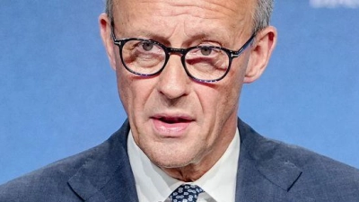 Bundeskanzler Merz betont Verlässlichkeit in der Klimapolitik.  (Foto: Kay Nietfeld/dpa)