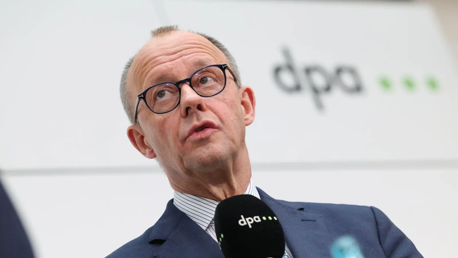 Ein Jahr nach der Bundestagswahl zieht der Kanzler Bilanz. (Foto: Christian Charisius/dpa)