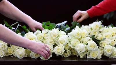 Nationaler Trauertag nach dem Brand in der Silvesternacht. (Foto: Pierre Albouy/REUTERS POOL KEYSTONE/dpa)