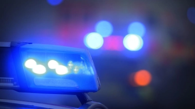 Die Polizei sucht in Neustadt/Aisch nach einer Frau, die unerlaubt ein Wohnhaus am Schafäckerlein betreten hat. (Symbolbild: Karl-Josef Hildenbrand/dpa)