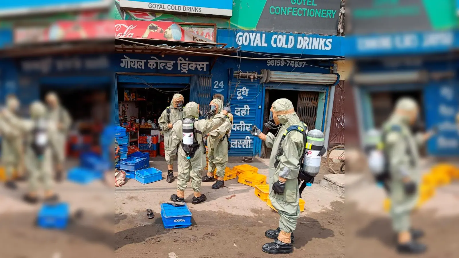 Mitarbeiter der National Disaster Response Force (NDRF) bei der Evakuierung von Menschen nach einem Gasleck in Ludhiana. (Foto: Uncredited/National Disaster Response Force/AP/dpa)