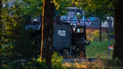 Die Polizei ruft Besucher auf, ihre Videos für Ermittlungen zur Verfügung zu stellen.  (Foto: Michael Buholzer/KEYSTONE/dpa)