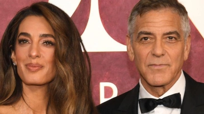Die Menschenrechtsanwältin Amal Alamuddin Clooney und der Oscar-prämierte Schauspieler George Clooney leben mit ihren Zwillingen auf einem Bauernhof in Südfrankreich. (Archivbild) (Foto: Evan Agostini/Invision/dpa)