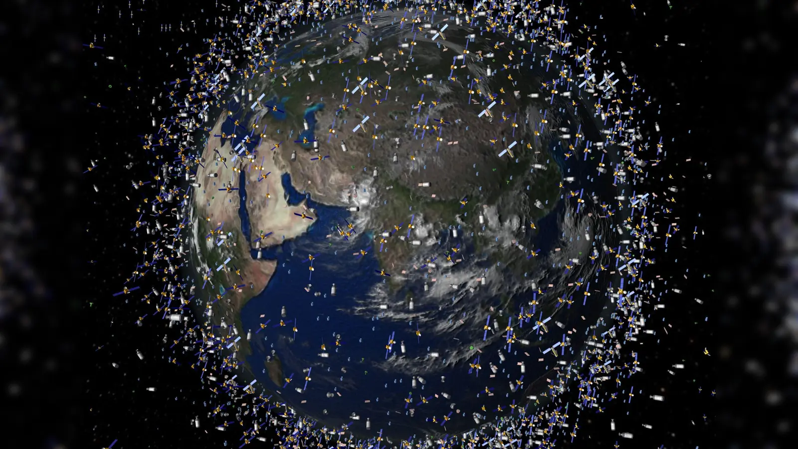 Tausende Satelliten und noch mehr Trümmerteile umfliegen die Erde - auch wenn sie eigentlich kleiner sind als auf diesem Bild. (Foto: ESA/ESA/dpa)