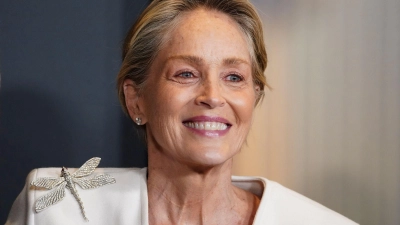 US-Filmstar Sharon Stone („Basic Instinct“) begleitet den österreichischen Süßwaren-Unternehmer Karl Guschlbauer zum Wiener Opernball. (Foto: Jordan Strauss/Invision via AP/dpa)