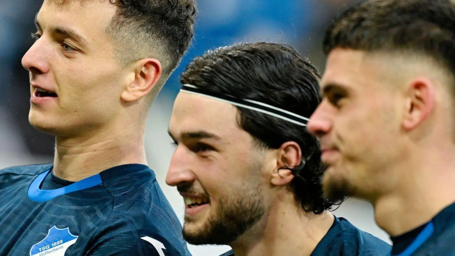 Torschütze Fisnik Asllani (l.): Hoffenheim wirbelt und feiert. (Foto: Uwe Anspach/dpa)