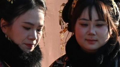 Traditionelle Kleidung und klassische Architektur sind auch in China der Renner für Social-Media-Inhalte.  (Foto: Johannes Neudecker/dpa)