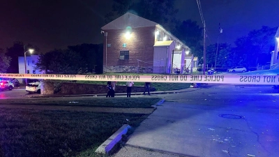 Nach den Schüssen sperrt die Polizei den Tatort im Stadtteil Brooklyn Homes in baltimore ab. (Foto: Uncredited/Baltimore Police Department/AP/dpa)