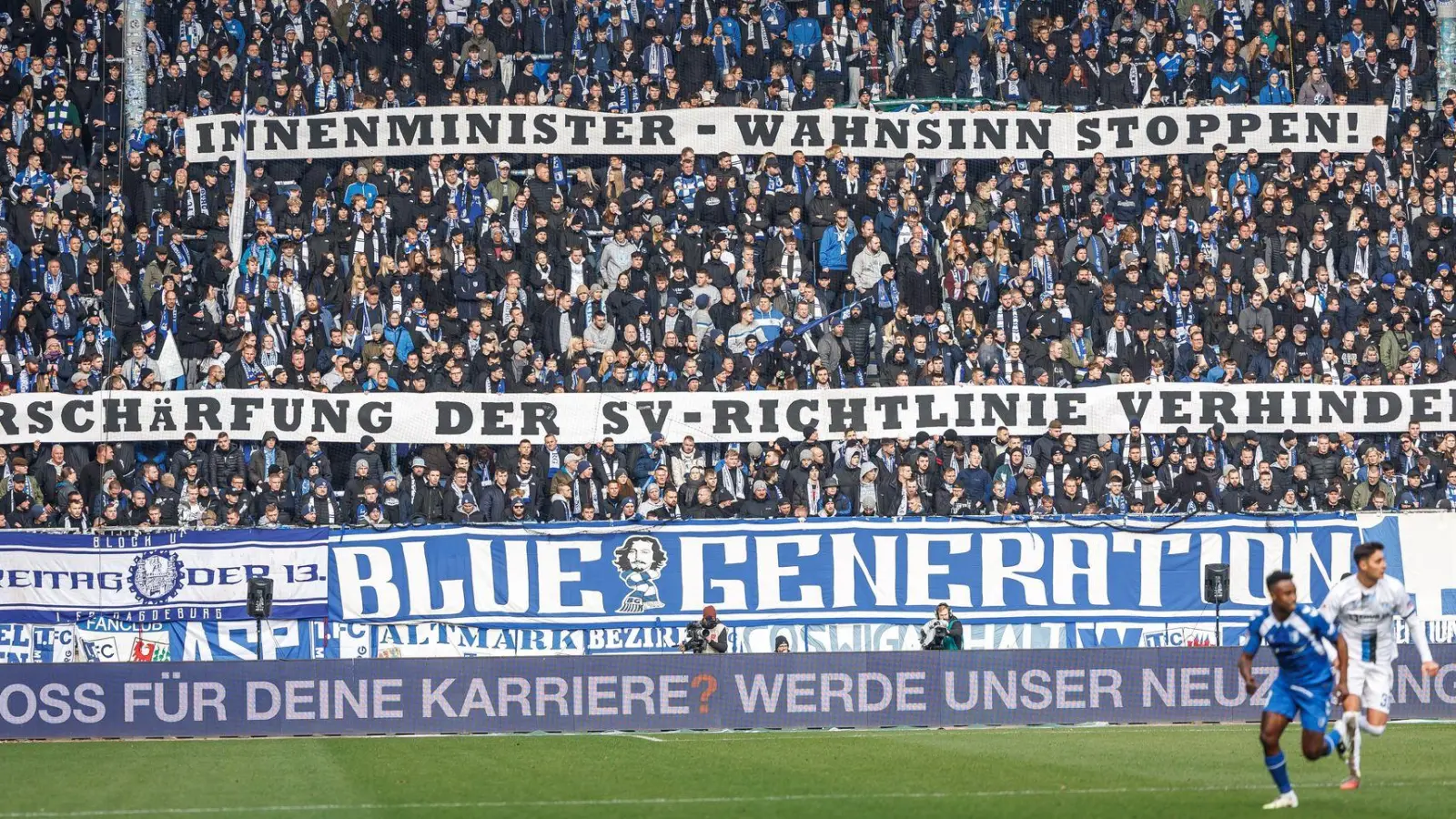 Magdeburger Fans äußern sich zum Thema Stadionverbote. (Foto: Andreas Gora/dpa)