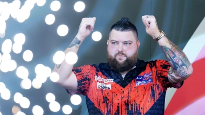 Michael Smith trifft im Halbfinale auf Gabriel Clemens oder Gerwyn Price. (Foto: Zac Goodwin/PA Wire/dpa)