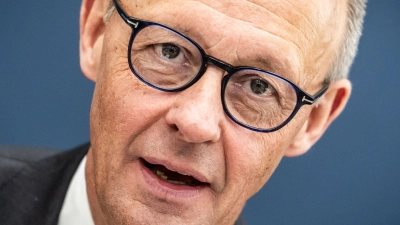 Die Personalrochade des Kanzlers geht in die nächste Runde. (Foto: Michael Kappeler/dpa)