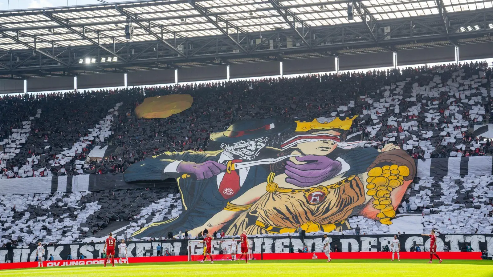 Die umstrittene Choreographie der Kölner Fanszene. (Foto: Justin Derondeau/Eibner-Pressefoto/dpa)